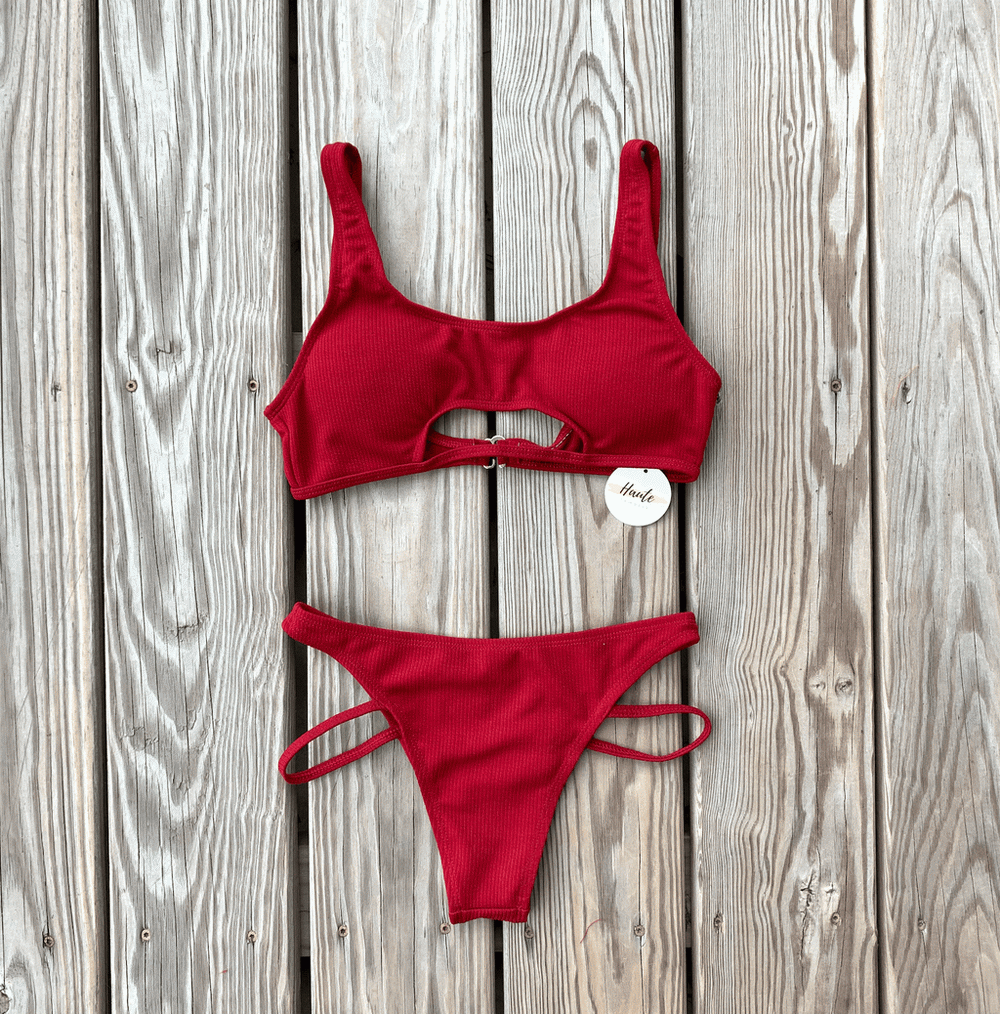 red ribbed bikini with a cutout design
