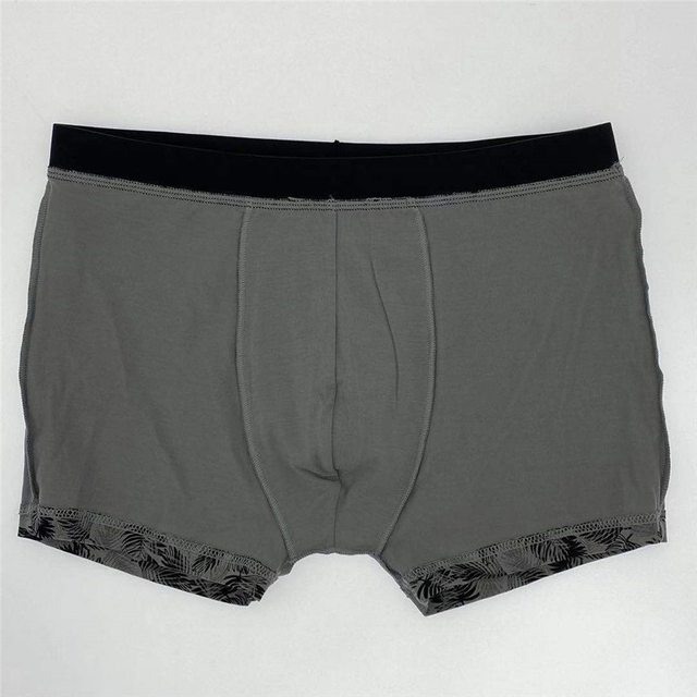 Boxer pour homme imprimé feuilles noires sur base grise