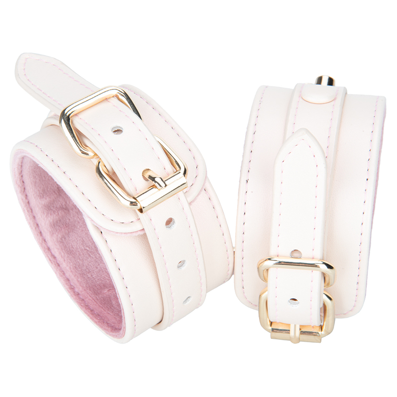 Imbracatura regolabile in pelle PU foderata in peluche rosa crema con set di manette con grillo