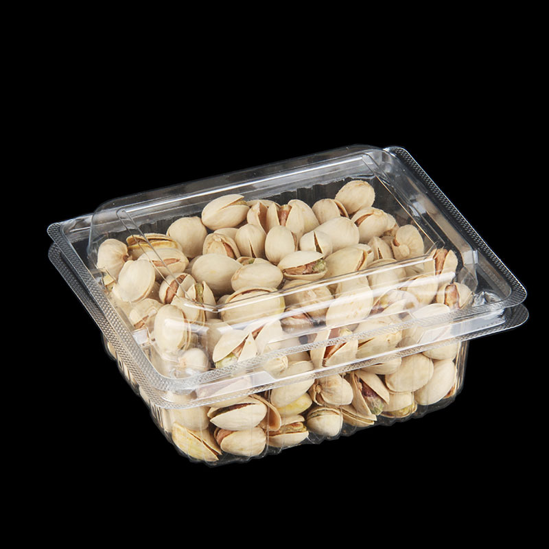 Transparenter Obstverpackungsbeh&auml;lter aus PET, der frische Produkte im Verkaufsregal pr&auml;sentiert